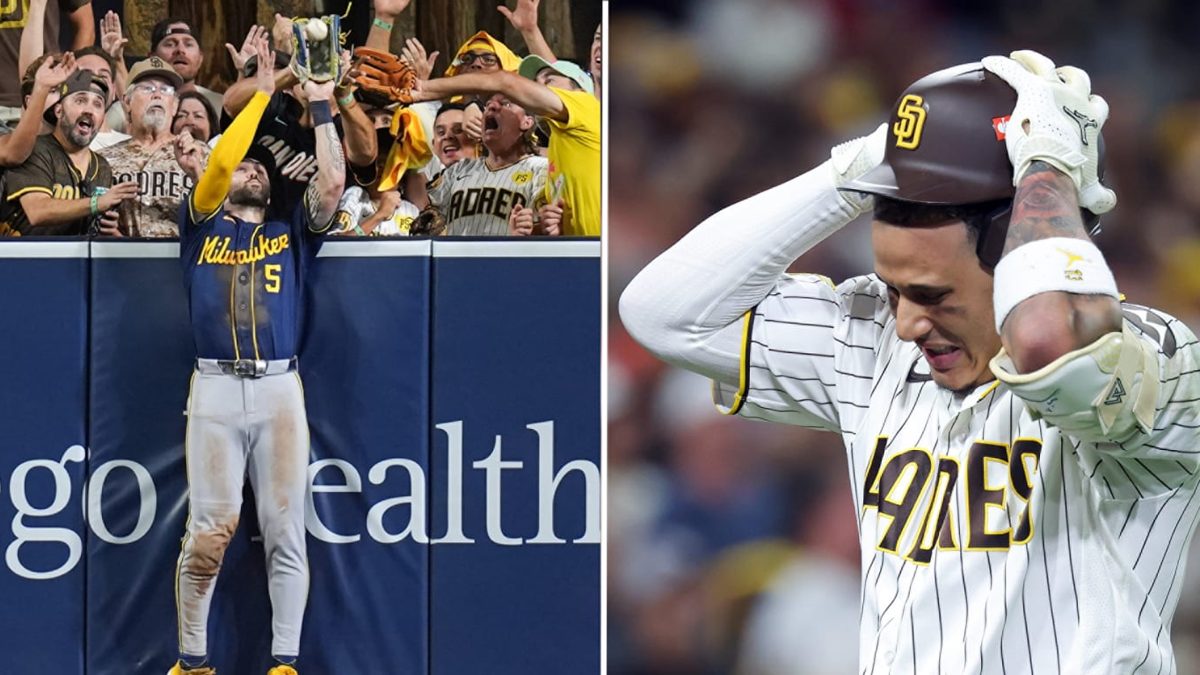 Manny Machado sostiene su casco con ambas manos tras ver su elevado de 406 pies atrapado en el aviso del Petco Park