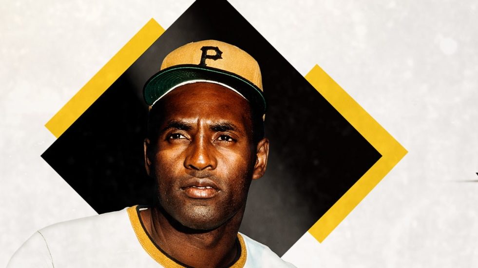 Trofeo del Premio Roberto Clemente de MLB con peloteros nominados 2026 en el fondo