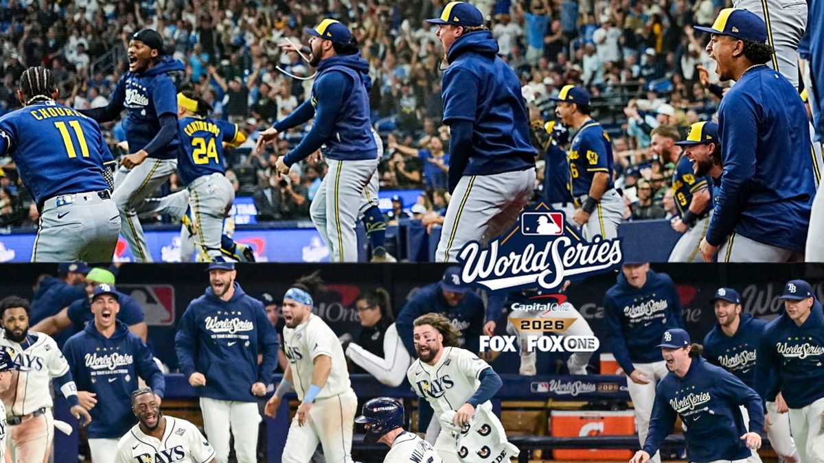 Ben Williamson celebra con sus compañeros de los Rays tras empujar la carrera ganadora en el Juego 4 de la Serie Mundial en el Tropicana Field
